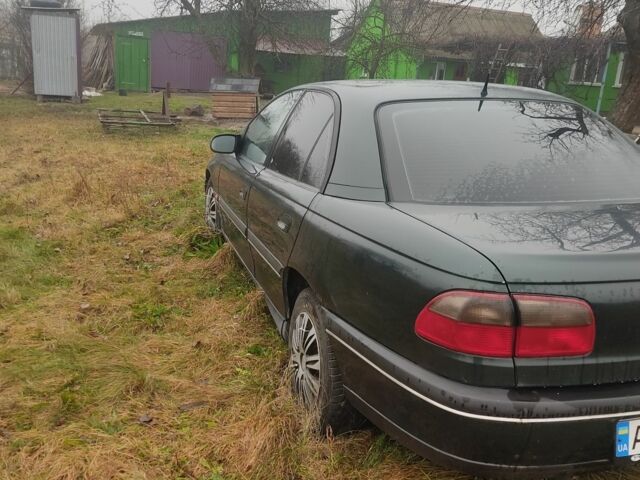 Зеленый Опель Омега, объемом двигателя 2.5 л и пробегом 140 тыс. км за 1100 $, фото 5 на Automoto.ua