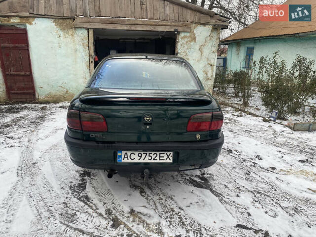 Зеленый Опель Омега, объемом двигателя 1.8 л и пробегом 100 тыс. км за 1750 $, фото 3 на Automoto.ua