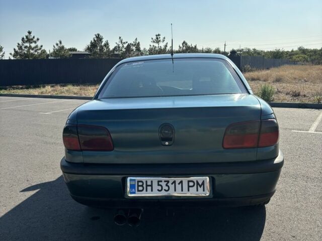 Зеленый Опель Омега, объемом двигателя 2.5 л и пробегом 300 тыс. км за 2500 $, фото 5 на Automoto.ua