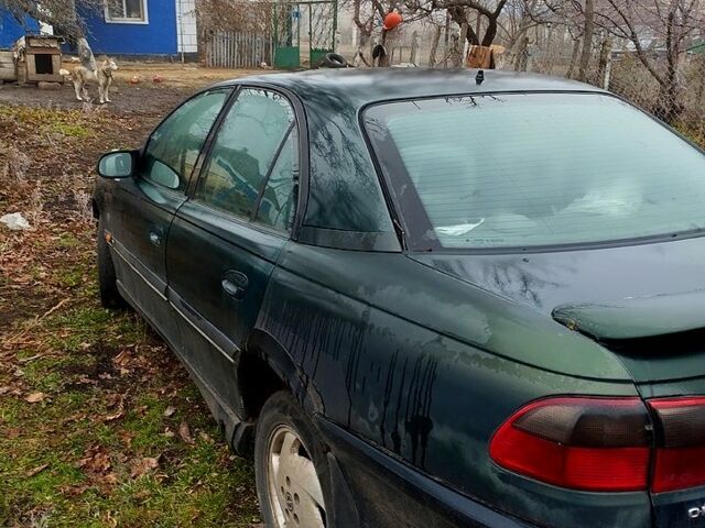 Зеленый Опель Омега, объемом двигателя 2.5 л и пробегом 370 тыс. км за 1050 $, фото 1 на Automoto.ua