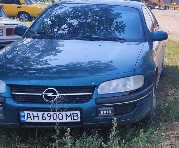 Зеленый Опель Омега, объемом двигателя 2 л и пробегом 268 тыс. км за 2500 $, фото 5 на Automoto.ua