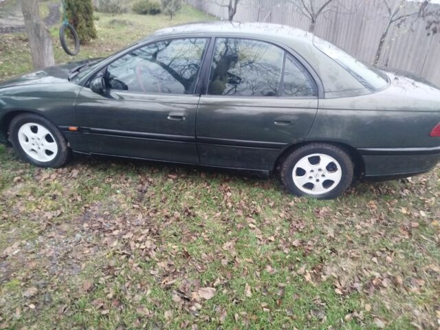 Зеленый Опель Омега, объемом двигателя 2 л и пробегом 355 тыс. км за 1300 $, фото 2 на Automoto.ua