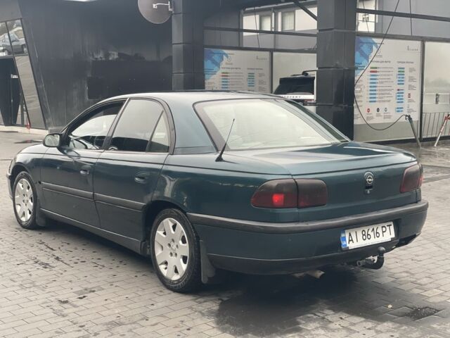 Зеленый Опель Омега, объемом двигателя 2 л и пробегом 300 тыс. км за 1704 $, фото 2 на Automoto.ua