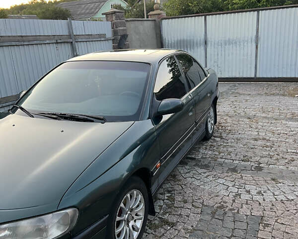 Зелений Опель Омега, об'ємом двигуна 2 л та пробігом 300 тис. км за 1700 $, фото 2 на Automoto.ua