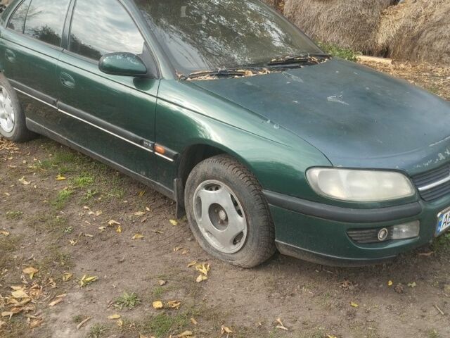 Зелений Опель Омега, об'ємом двигуна 3 л та пробігом 320 тис. км за 702 $, фото 7 на Automoto.ua