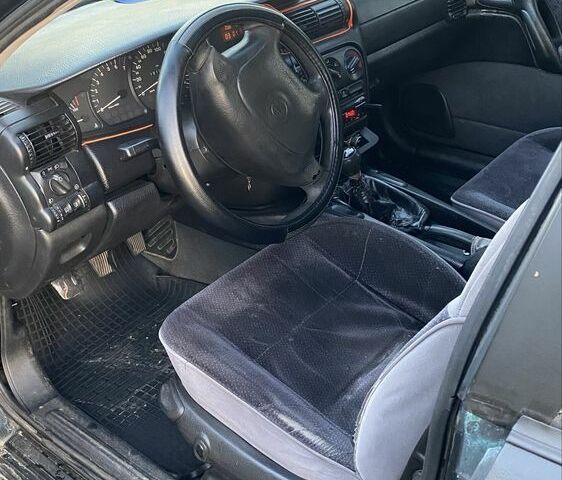 Зеленый Опель Омега, объемом двигателя 2 л и пробегом 3 тыс. км за 1500 $, фото 2 на Automoto.ua