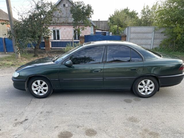 Зелений Опель Омега, об'ємом двигуна 2 л та пробігом 250 тис. км за 1300 $, фото 2 на Automoto.ua
