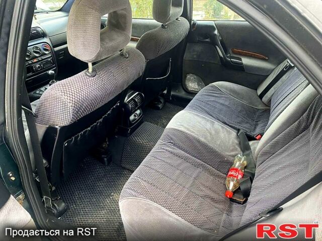 Зелений Опель Омега, об'ємом двигуна 1.8 л та пробігом 0 тис. км за 1750 $, фото 10 на Automoto.ua