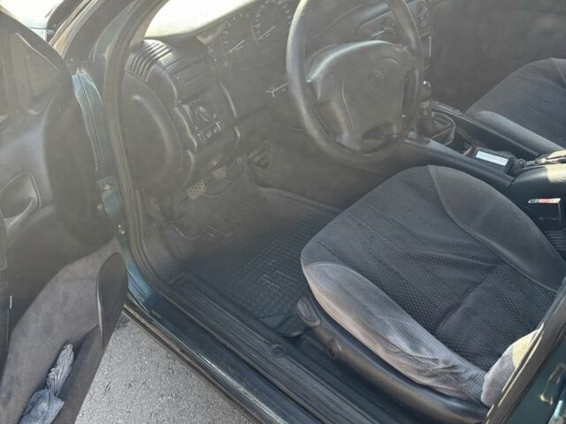 Зеленый Опель Омега, объемом двигателя 2.5 л и пробегом 300 тыс. км за 2500 $, фото 9 на Automoto.ua