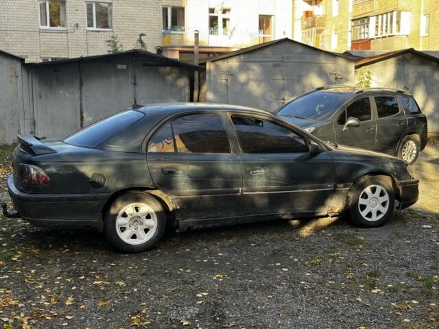 Зелений Опель Омега, об'ємом двигуна 2 л та пробігом 361 тис. км за 1499 $, фото 3 на Automoto.ua