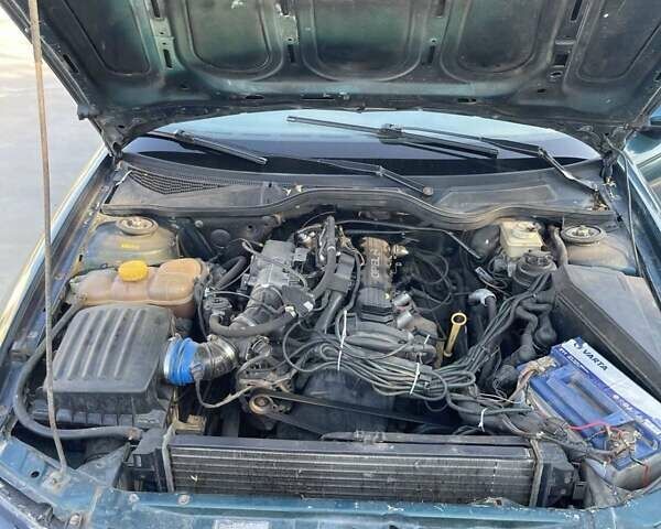 Зеленый Опель Омега, объемом двигателя 2 л и пробегом 300 тыс. км за 1800 $, фото 18 на Automoto.ua