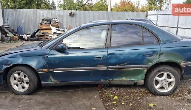 Зелений Опель Омега, об'ємом двигуна 2 л та пробігом 180 тис. км за 650 $, фото 3 на Automoto.ua