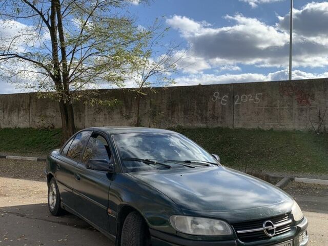 Зелений Опель Омега, об'ємом двигуна 2 л та пробігом 250 тис. км за 1300 $, фото 1 на Automoto.ua