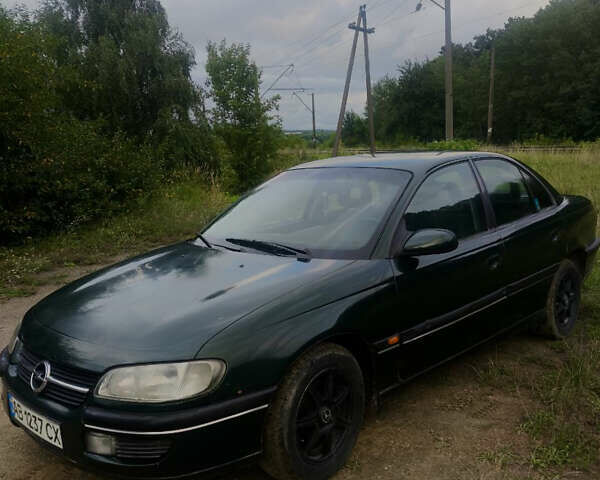 Зеленый Опель Омега, объемом двигателя 2 л и пробегом 298 тыс. км за 1600 $, фото 4 на Automoto.ua