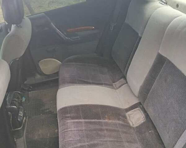 Зеленый Опель Омега, объемом двигателя 2 л и пробегом 350 тыс. км за 1700 $, фото 5 на Automoto.ua