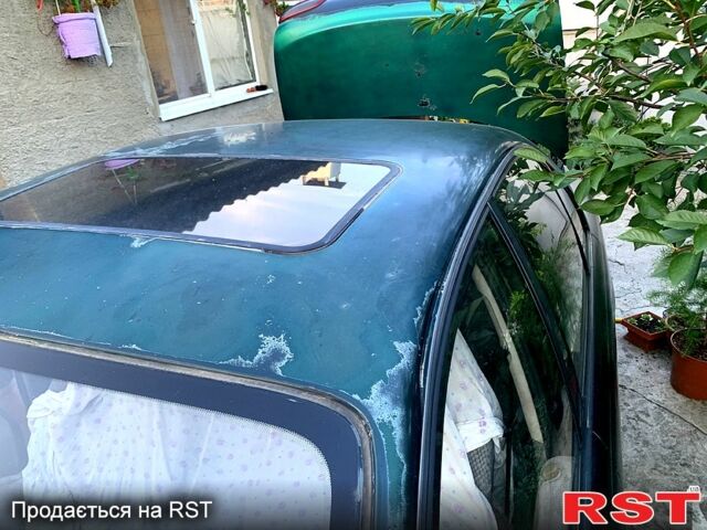 Зеленый Опель Омега, объемом двигателя 2 л и пробегом 250 тыс. км за 800 $, фото 1 на Automoto.ua