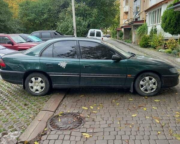 Зеленый Опель Омега, объемом двигателя 2 л и пробегом 442 тыс. км за 2000 $, фото 4 на Automoto.ua