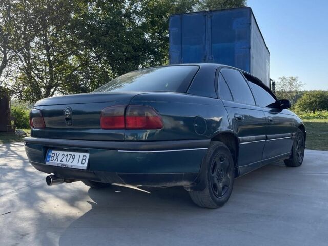 Зеленый Опель Омега, объемом двигателя 2 л и пробегом 300 тыс. км за 1800 $, фото 5 на Automoto.ua