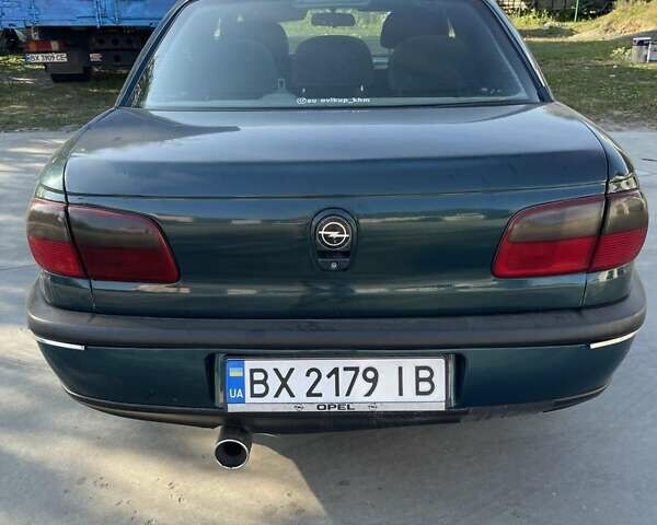 Зеленый Опель Омега, объемом двигателя 2 л и пробегом 350 тыс. км за 2100 $, фото 6 на Automoto.ua