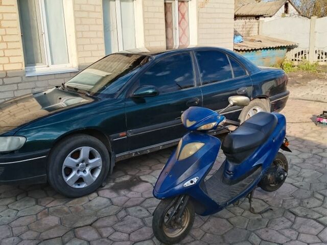 Зеленый Опель Омега, объемом двигателя 2 л и пробегом 3 тыс. км за 955 $, фото 4 на Automoto.ua
