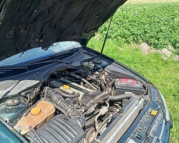 Зеленый Опель Омега, объемом двигателя 2 л и пробегом 407 тыс. км за 1750 $, фото 5 на Automoto.ua