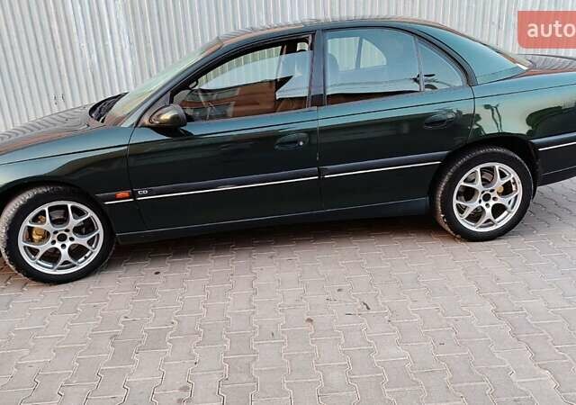 Зелений Опель Омега, об'ємом двигуна 2.6 л та пробігом 269 тис. км за 2500 $, фото 5 на Automoto.ua