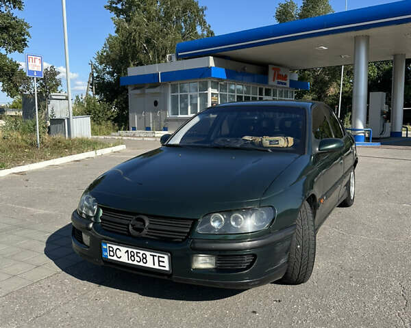 Зелений Опель Омега, об'ємом двигуна 2.5 л та пробігом 380 тис. км за 2250 $, фото 6 на Automoto.ua