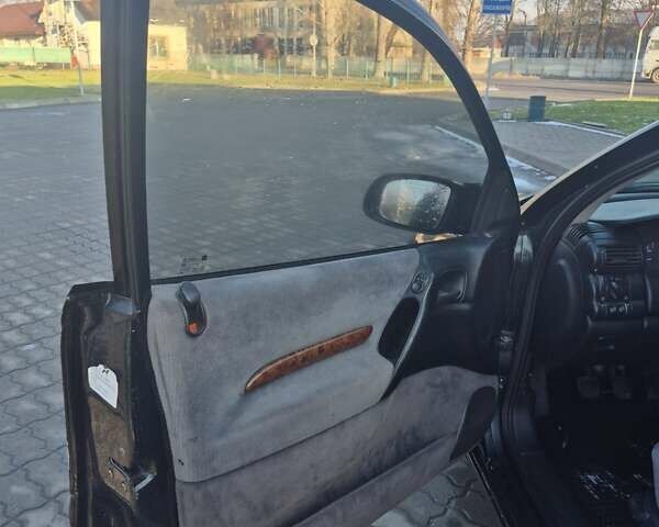 Зеленый Опель Омега, объемом двигателя 2.6 л и пробегом 270 тыс. км за 2500 $, фото 6 на Automoto.ua