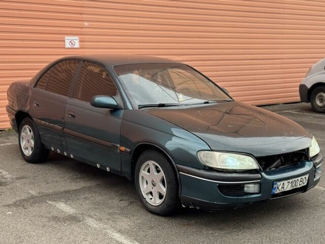 Зеленый Опель Омега, объемом двигателя 2 л и пробегом 300 тыс. км за 1250 $, фото 2 на Automoto.ua