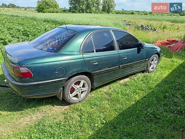 Зеленый Опель Омега, объемом двигателя 2 л и пробегом 407 тыс. км за 1750 $, фото 3 на Automoto.ua