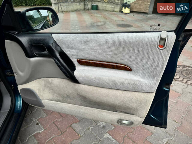 Зеленый Опель Омега, объемом двигателя 2 л и пробегом 315 тыс. км за 2950 $, фото 22 на Automoto.ua