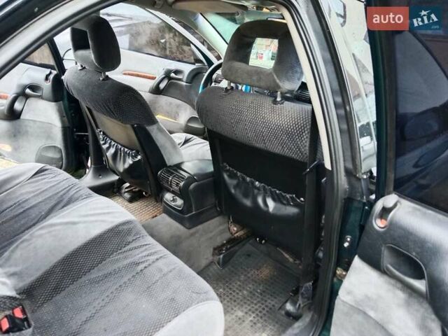 Зеленый Опель Омега, объемом двигателя 2 л и пробегом 360 тыс. км за 3000 $, фото 10 на Automoto.ua