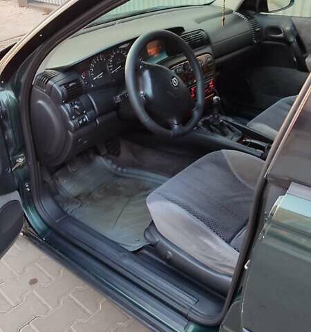 Зелений Опель Омега, об'ємом двигуна 2.6 л та пробігом 269 тис. км за 2500 $, фото 2 на Automoto.ua