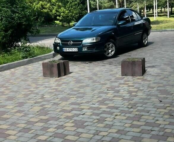 Зеленый Опель Омега, объемом двигателя 2 л и пробегом 200 тыс. км за 2200 $, фото 5 на Automoto.ua