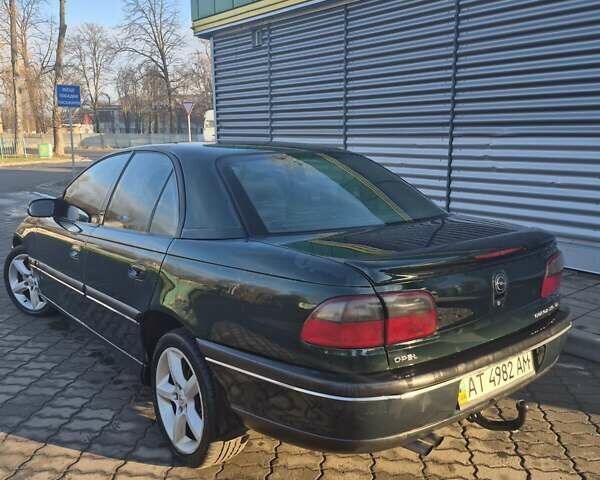 Зеленый Опель Омега, объемом двигателя 2.6 л и пробегом 270 тыс. км за 2500 $, фото 2 на Automoto.ua