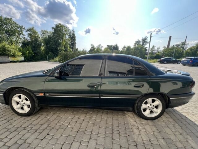 Зеленый Опель Омега, объемом двигателя 2 л и пробегом 240 тыс. км за 3500 $, фото 4 на Automoto.ua