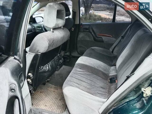 Зеленый Опель Омега, объемом двигателя 2 л и пробегом 360 тыс. км за 3000 $, фото 9 на Automoto.ua