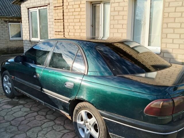 Зеленый Опель Омега, объемом двигателя 2 л и пробегом 3 тыс. км за 955 $, фото 1 на Automoto.ua