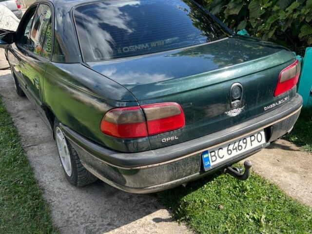 Зелений Опель Омега, об'ємом двигуна 2 л та пробігом 420 тис. км за 1600 $, фото 4 на Automoto.ua