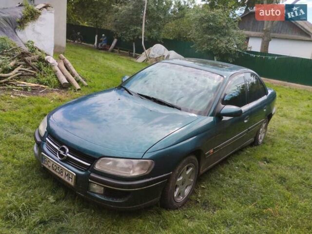 Зеленый Опель Омега, объемом двигателя 2 л и пробегом 423 тыс. км за 1500 $, фото 3 на Automoto.ua