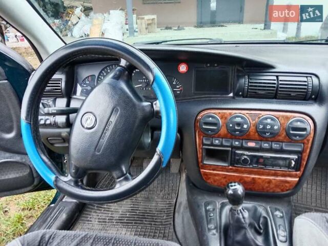 Зеленый Опель Омега, объемом двигателя 2 л и пробегом 360 тыс. км за 3000 $, фото 16 на Automoto.ua