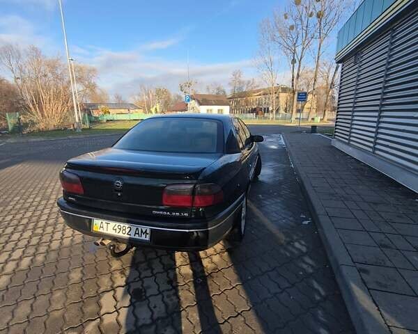 Зеленый Опель Омега, объемом двигателя 2.6 л и пробегом 270 тыс. км за 2500 $, фото 18 на Automoto.ua