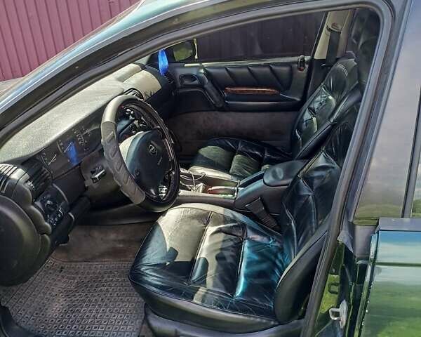 Зеленый Опель Омега, объемом двигателя 2 л и пробегом 407 тыс. км за 1750 $, фото 4 на Automoto.ua