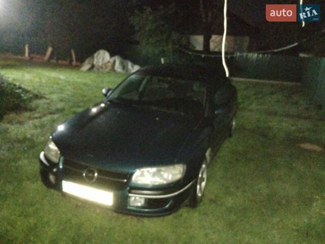 Зеленый Опель Омега, объемом двигателя 2 л и пробегом 423 тыс. км за 1500 $, фото 6 на Automoto.ua