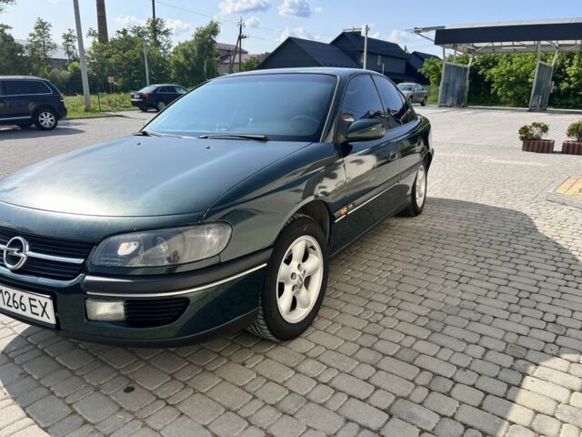 Зеленый Опель Омега, объемом двигателя 2 л и пробегом 240 тыс. км за 3500 $, фото 3 на Automoto.ua