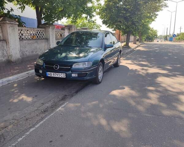 Зеленый Опель Омега, объемом двигателя 2 л и пробегом 200 тыс. км за 2200 $, фото 8 на Automoto.ua