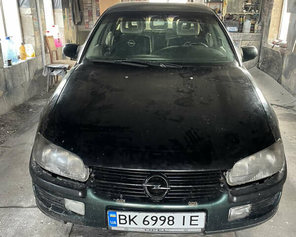 Зеленый Опель Омега, объемом двигателя 2.5 л и пробегом 400 тыс. км за 1700 $, фото 2 на Automoto.ua