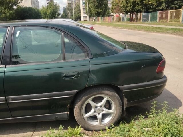 Зелений Опель Омега, об'ємом двигуна 2 л та пробігом 520 тис. км за 2000 $, фото 2 на Automoto.ua