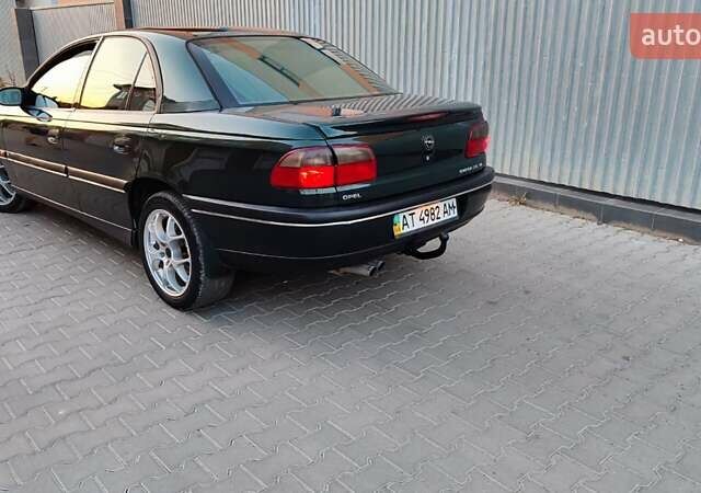 Зелений Опель Омега, об'ємом двигуна 2.6 л та пробігом 269 тис. км за 2500 $, фото 4 на Automoto.ua