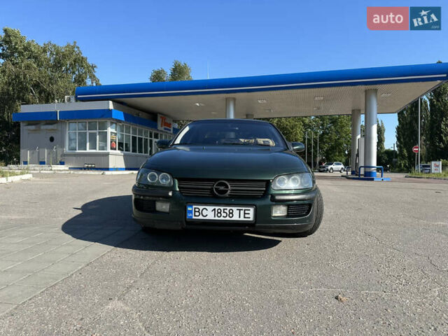 Зелений Опель Омега, об'ємом двигуна 2.5 л та пробігом 380 тис. км за 2200 $, фото 4 на Automoto.ua
